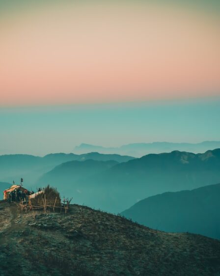 people standing on mountain during daytime